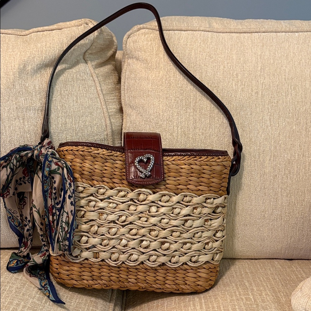 Elegant Woven Tan Shoulder Bag with Scarf Accent.